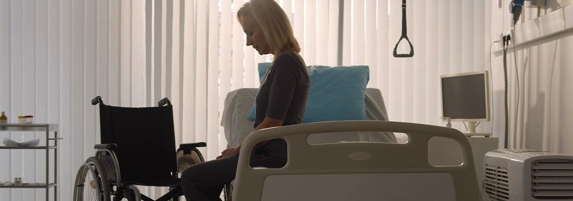 Depressed women in hospital bed
