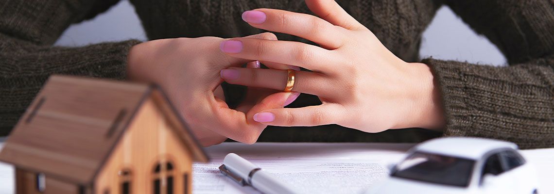 Woman removing her ring