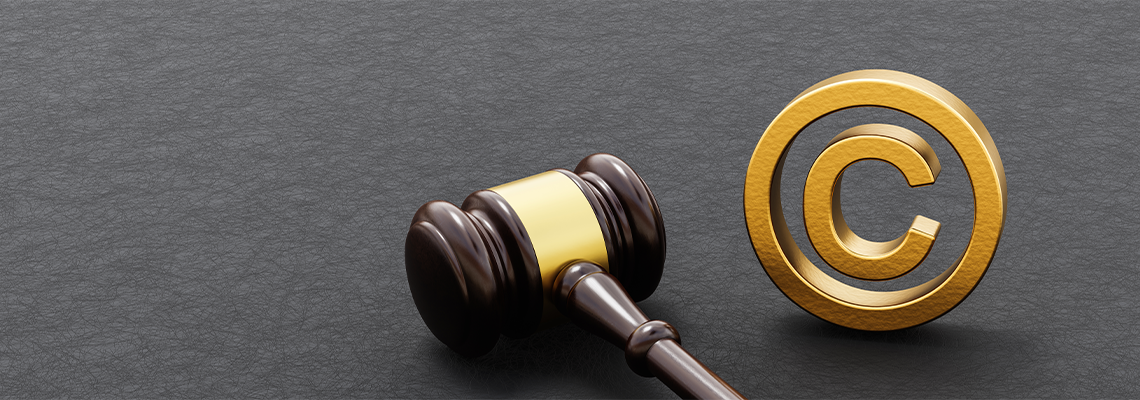 Judge's Gavel on Dark Background with Copyright Symbol