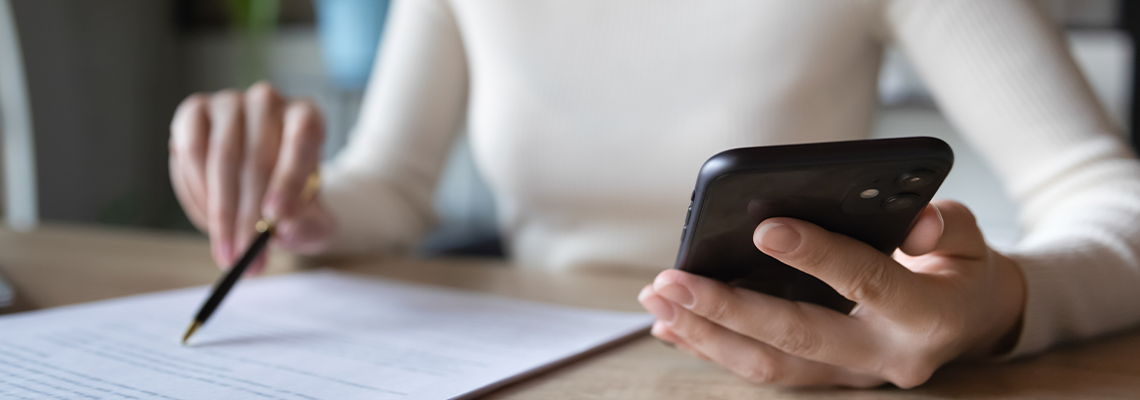 App Developer reading paper contract for patent agreement