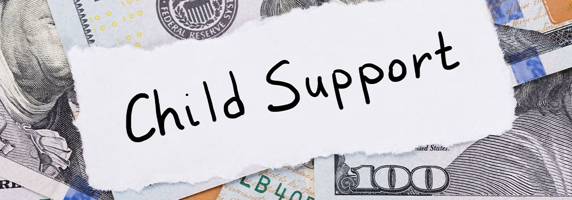 Child Support Note Placed On Top Of Dollar