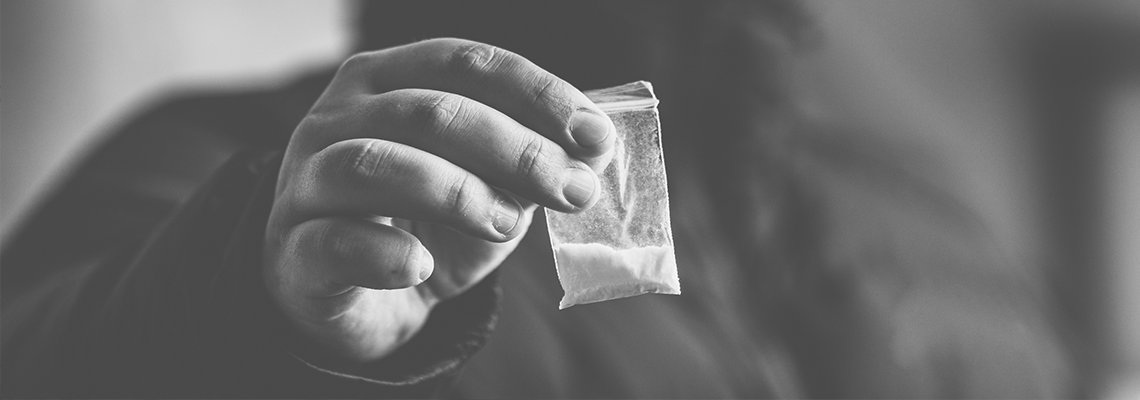 Drug dealer selling drugs junkie.