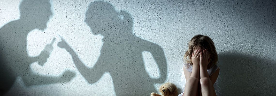 Little Girl Crying With Shadow Of Parents Arguing