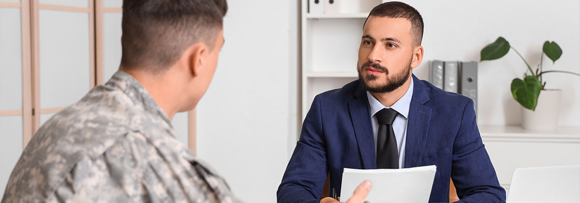 Male lawyer working with soldier in office