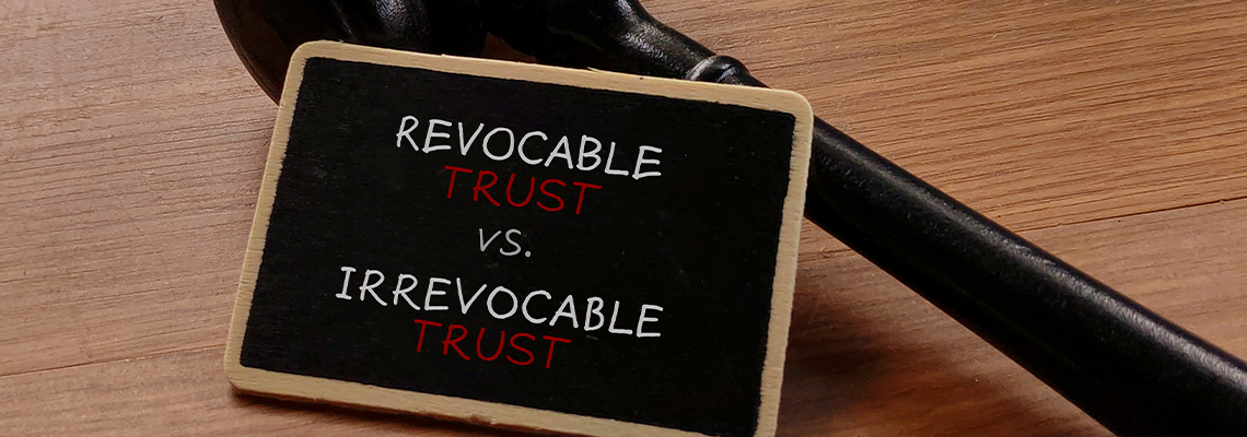 Revocable vs. Irrevocable Trust with Gavel on Wooden Table
