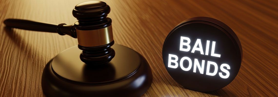 Gavel on table with sign that reads Bail Bonds