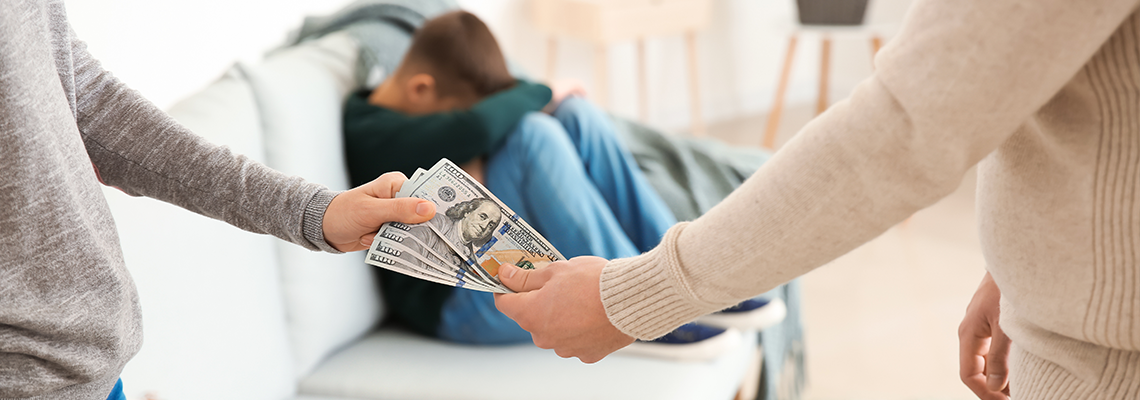 Man giving alimony to his ex-wife at home