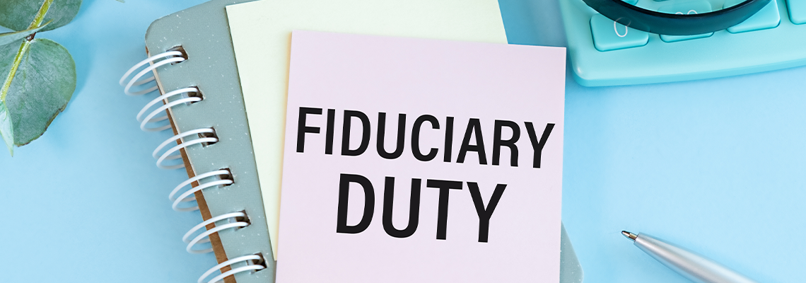 Fiduciary duty text the a card with pen