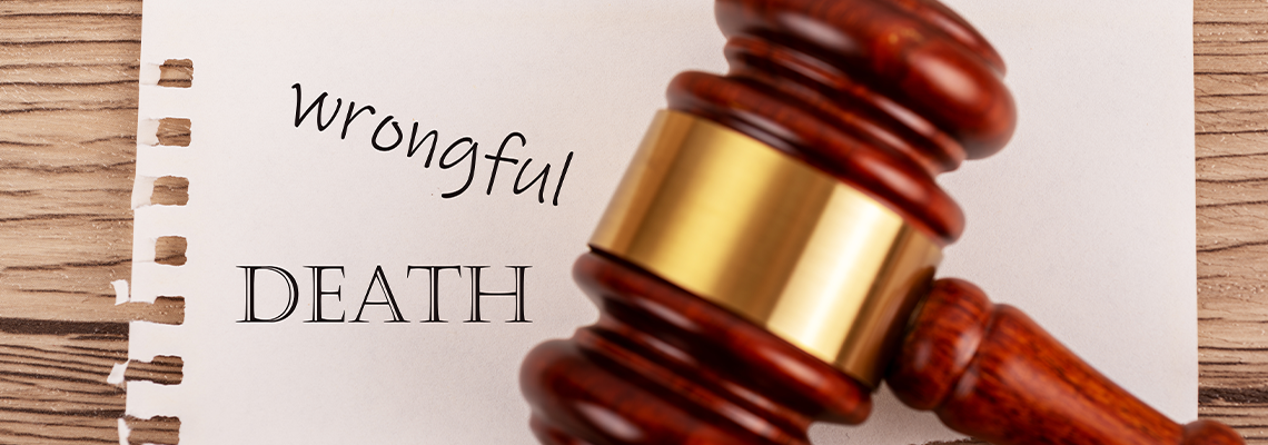 Judge gavel over wrongful death text, legal lawsuit, justice and compensation concept