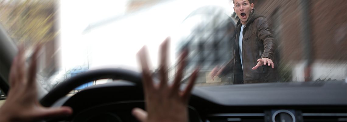 Car about to collide with pedestrian