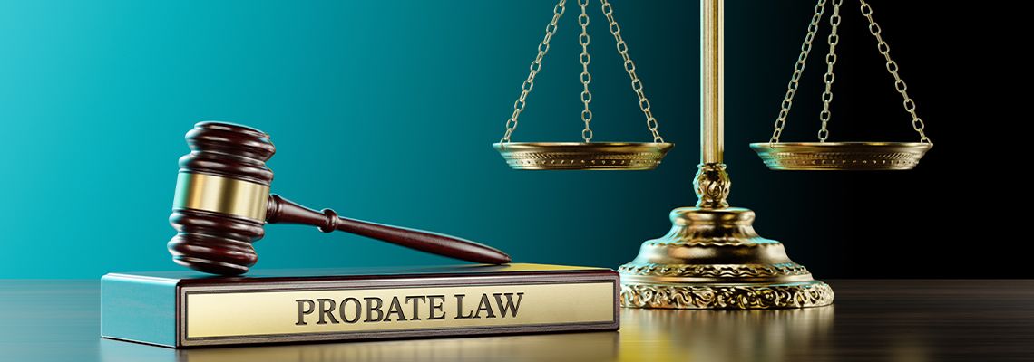 Probate law book, gavel and scale of justice