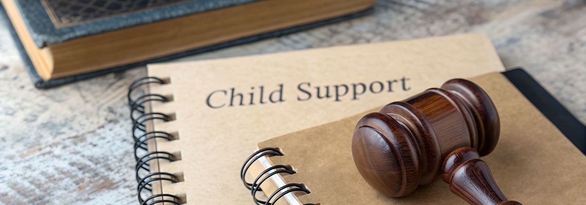 Gavel and Notebook labelled Child Support