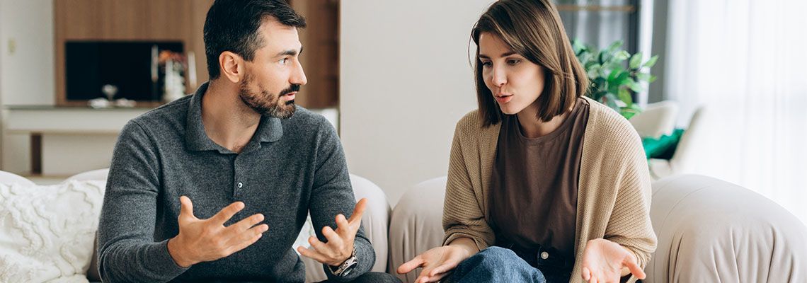 Couples arguing at home