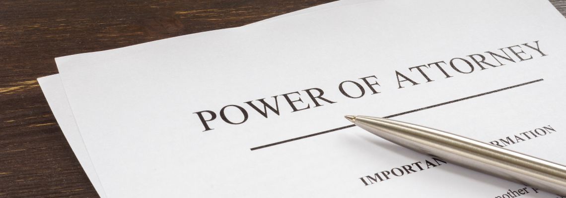 Power of attorney legal document and pen