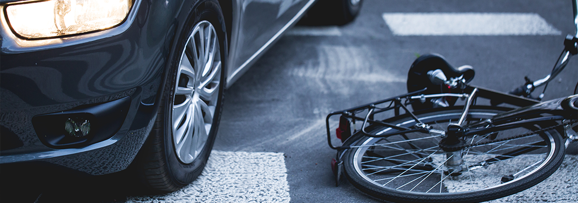 Car and bike accident on road