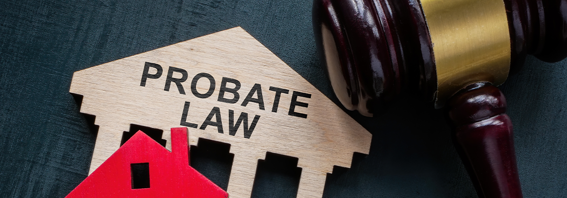 Probate law concept. Gavel and house model
