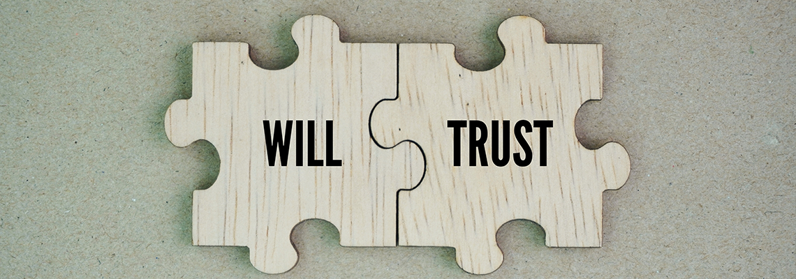 Wooden puzzle with the words will and trust