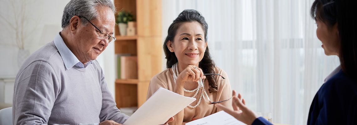 Couples preparing estate plan with professional