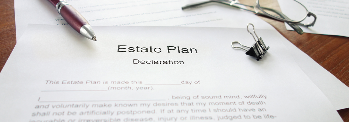 Estate Plan document with Pen and Glasses on table