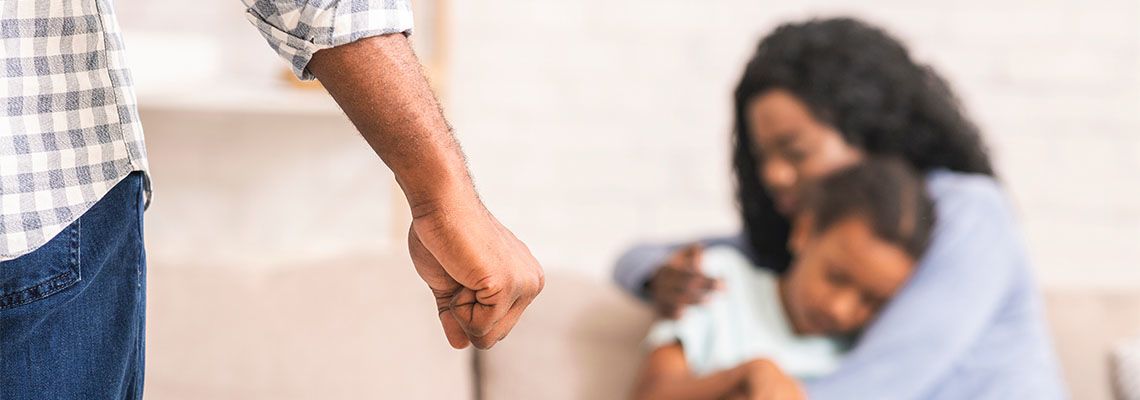 Mother and daughter suffering from domestic violence of father