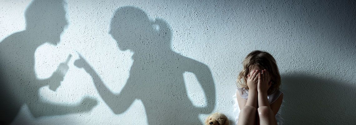 Little Girl Crying With Shadow Of Parents Arguing