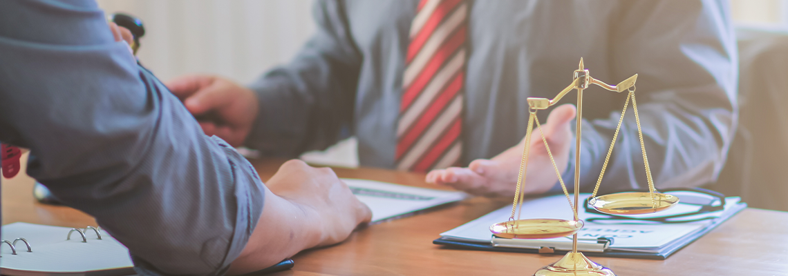 The lawyer is currently consulting on legal contract documents