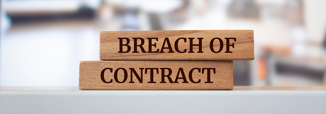 Wooden blocks with words 'BREACH OF CONTRACT'