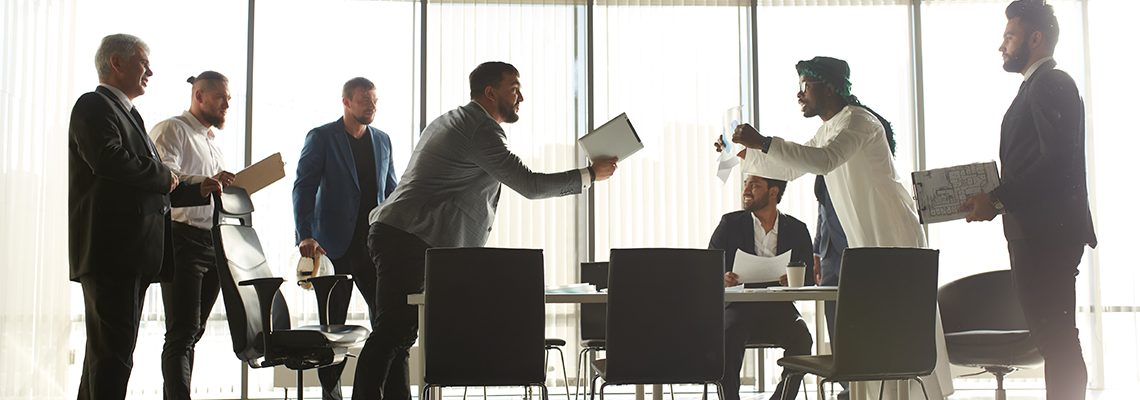 Business partners arguing about bad contract