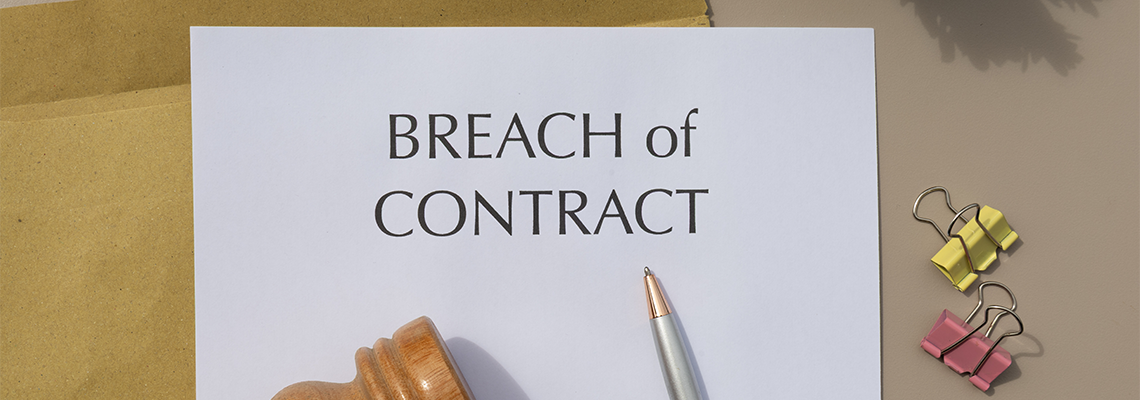 Legal Dispute Setup: Breach of Contract Document with Gavel and Pen