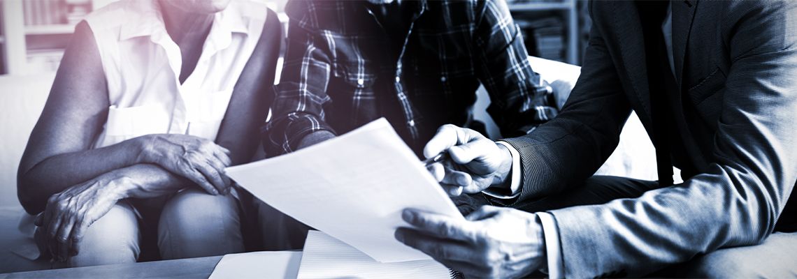 Senior couple preparing estate plan with attorney