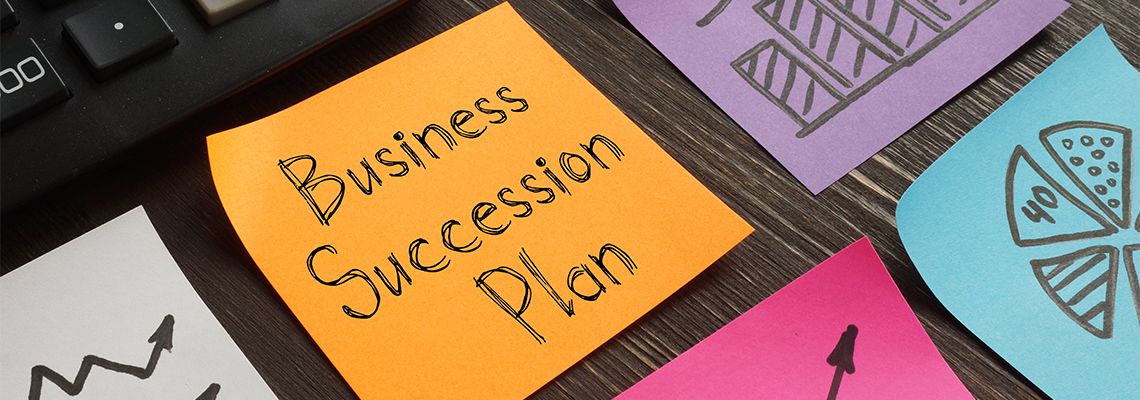 Business Succession Plan written in sticky note