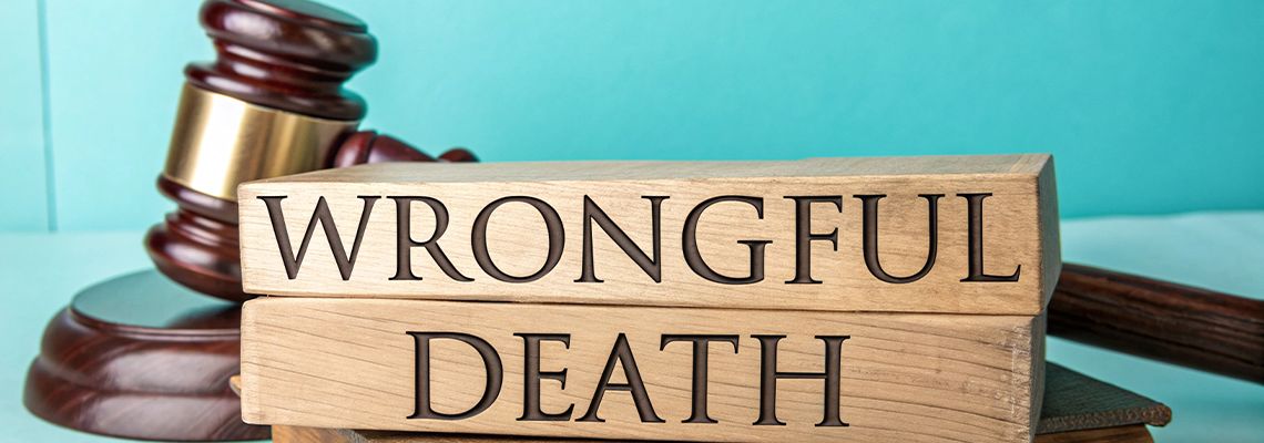 Gavel and Wrongful Death Inscription on wooden cube
