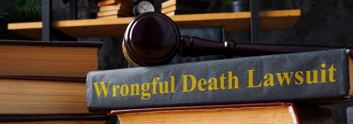 Wrongful Death Lawsuit book and gavel