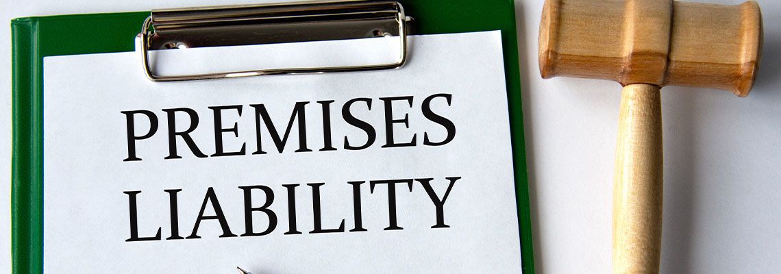 PREMISES LIABILITY words on a white sheet with gavel