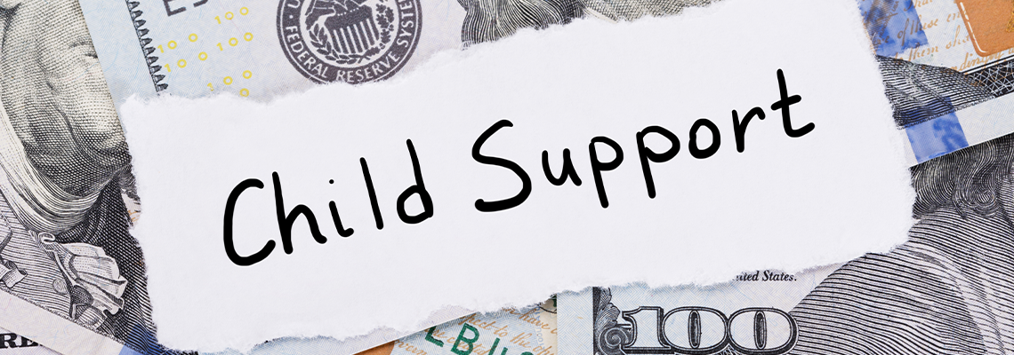 Child Support Note Placed On Top Of Dollar