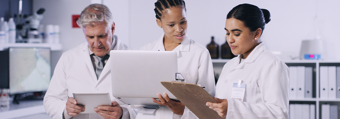 Scientist, team and technology with clipboard for chemistry, experiment and medical research