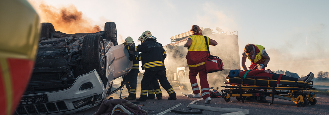 Paramedics and Firefighters Arrive On the Car Crash Traffic Accident Scene