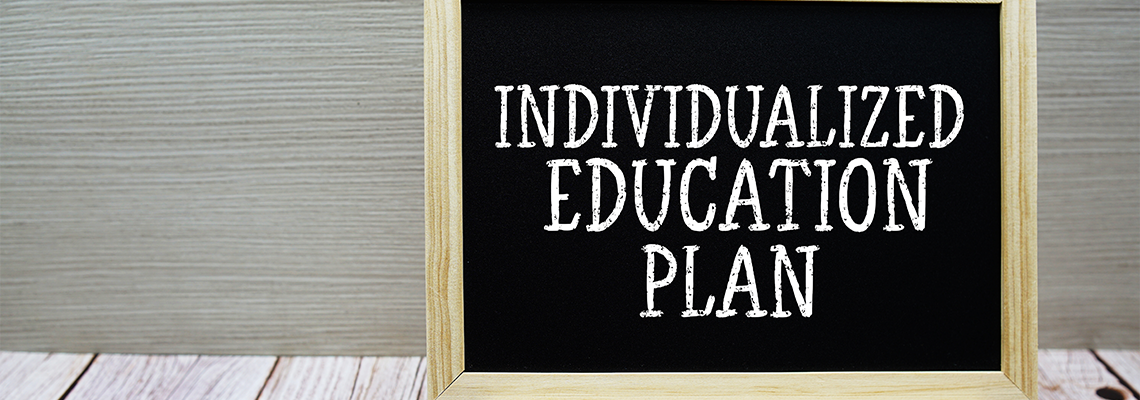 Individualized Education Plan text written on chalkboard
