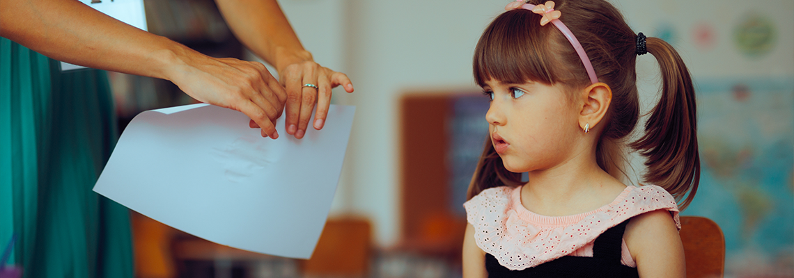 Teacher Tearing the Project of a Student After She Failed
