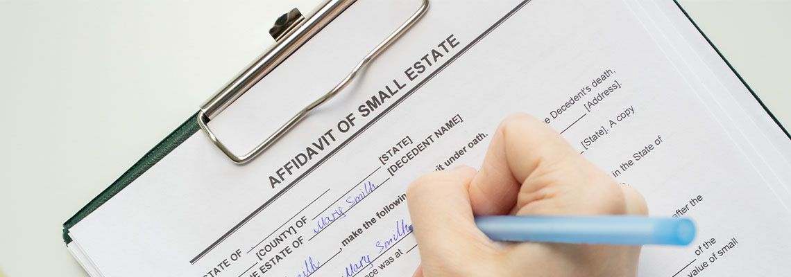 Women filling Affidavit of Small Estate