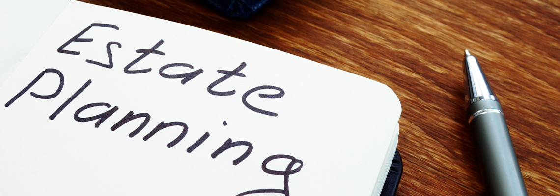 Estate planning handwriting sign on the sheet