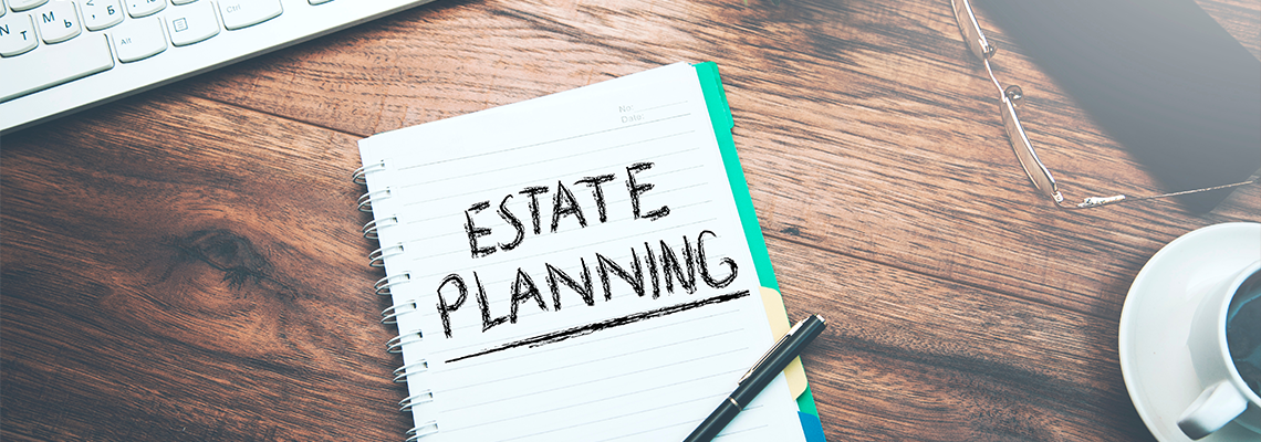 Text estate planning on notepad on table