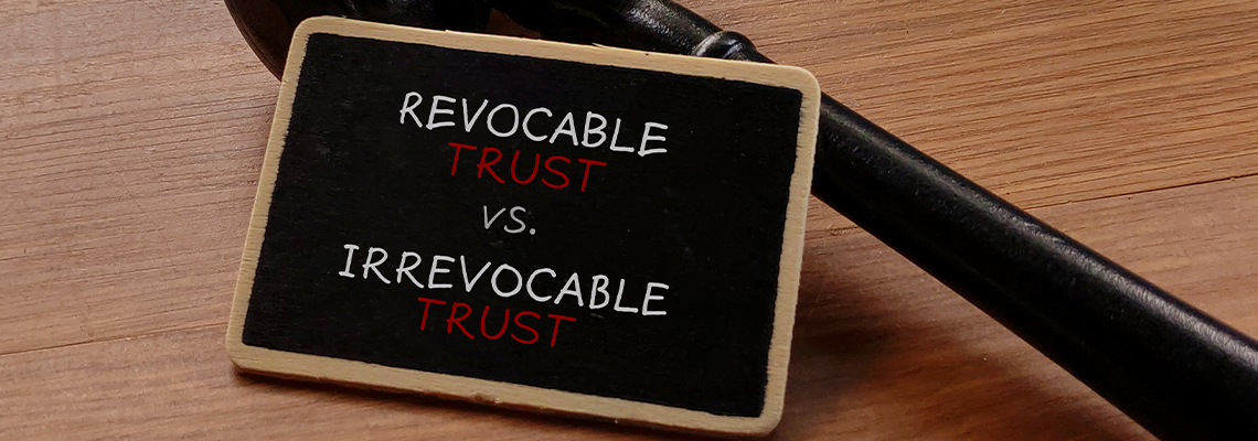 Revocable vs. Irrevocable Trust with Gavel on Wooden Table
