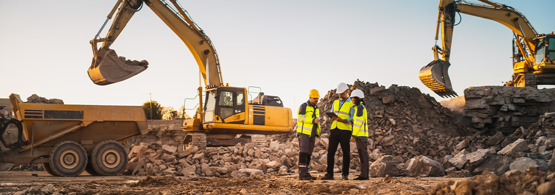 Construction Site With Excavators on Sunny Day
