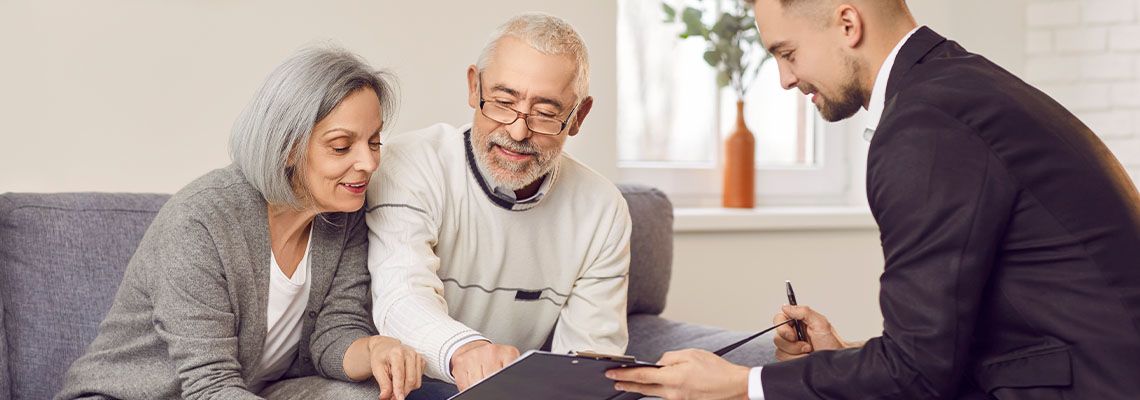 Old couples preparing financial plan with finance advisor