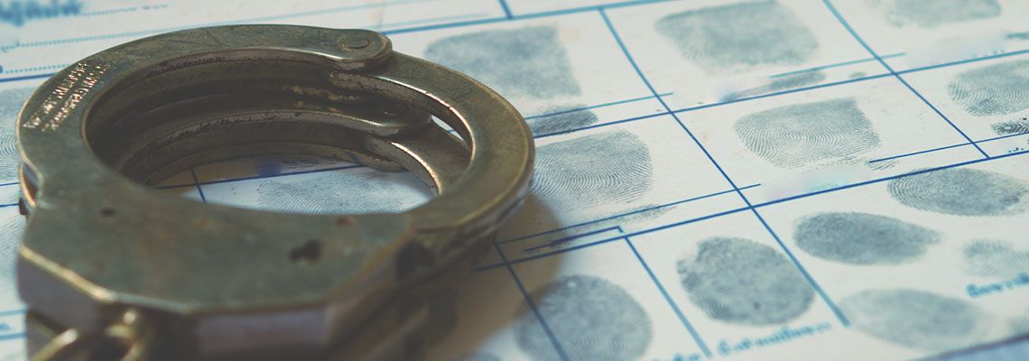 Handcuff and Criminal Record file in table