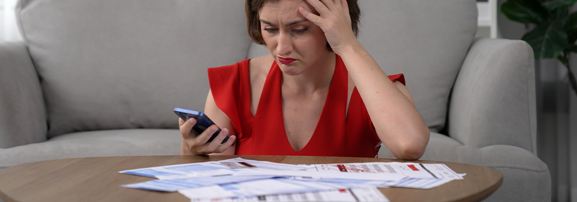 Young woman has financial problems with credit card debt to pay prim from bad personal money