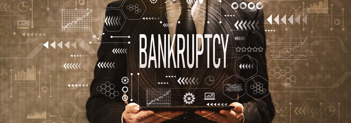 Bankruptcy with businessman holding a tablet computer