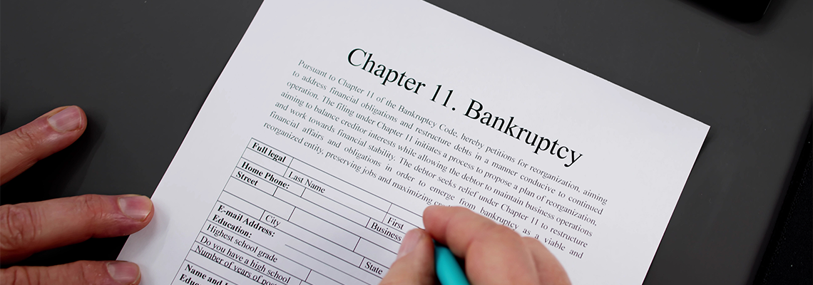 Chapter 11 Bankruptcy Form on Table
