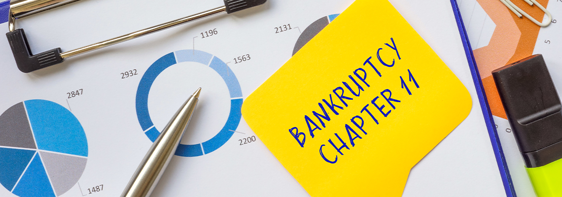 Financial concept meaning BANKRUPTCY CHAPTER 11 with sign on the page